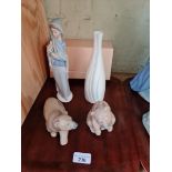A mixed lot comprising two Lladro bears, another Lladro figure and a Royal Doulton Impressions