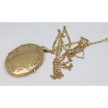 A 9ct gold locket and chain, gross wt. 4.8g. Condition - chain lacking clasp, general wear.