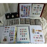 A collection of French and UK coins and UK, Isle of Man stamps and three pocket watches