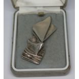 A white metal Transoceanic pendant, marked 'L. Mallella Boc. Nav. Transoceanica and Maltese cross'.