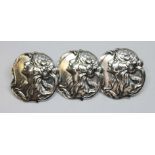 A set of three Edwardian Art Nouveau silver buttons, Henry Matthews, Birmingham 1902, diameter 24mm.