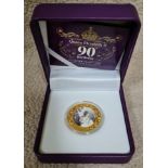 A boxed Queen Elizabeth 90th birthday silver proof coin.