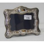 A hallmarked silver photograph frame 18cm x 14cm.