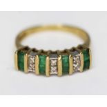 A hallmarked 9ct gold emerald and diamond ring, gross wt. 2.9g, size L.