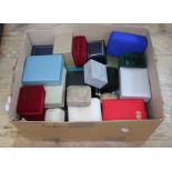 A box of empty vintage and modern jewellery boxes.