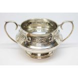 An imported twin handled silver bowl with Celtic style border, marked '925' 'S' and hallmarked for