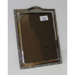 A hallmarked silver photograph frame 19cm x 26cm.