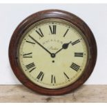 A spring driven round wall clock, the dial signed 'Hackler PReston', oak case, diameter 39cm.