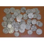 A quantity of two shillings and one shillings coins, dating between 1920 and 1946, wt. 480g.