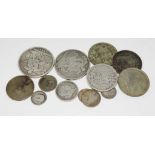 A collection of coins to include two crowns (1822 & 1889), four half crowns (1891-1942) and three