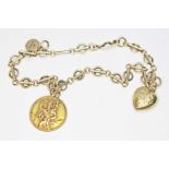 A charm bracelet with two St Christopher charms, one marked '9ct' and the other hallmarked 9ct gold,