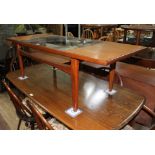 A mid 20th century G-Plan teak and glass top coffee table, length 137cm.