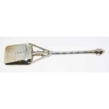 A Victorian silver caddy spoon of ecclesiastical design, with orb finial, lozenge shaped shaft