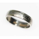A platinum wedding band, D section ring with engraved design, sponsor's mark 'CG&S', marked '