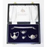 An Elizabeth II cased five piece silver tea set, A Chick & Sons Ltd, London 1978, gross wt. 2.11ozt.