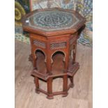 A Moorish mahogany and mother of pearl occasional table, inlaid with fish to the top, circa 1900,