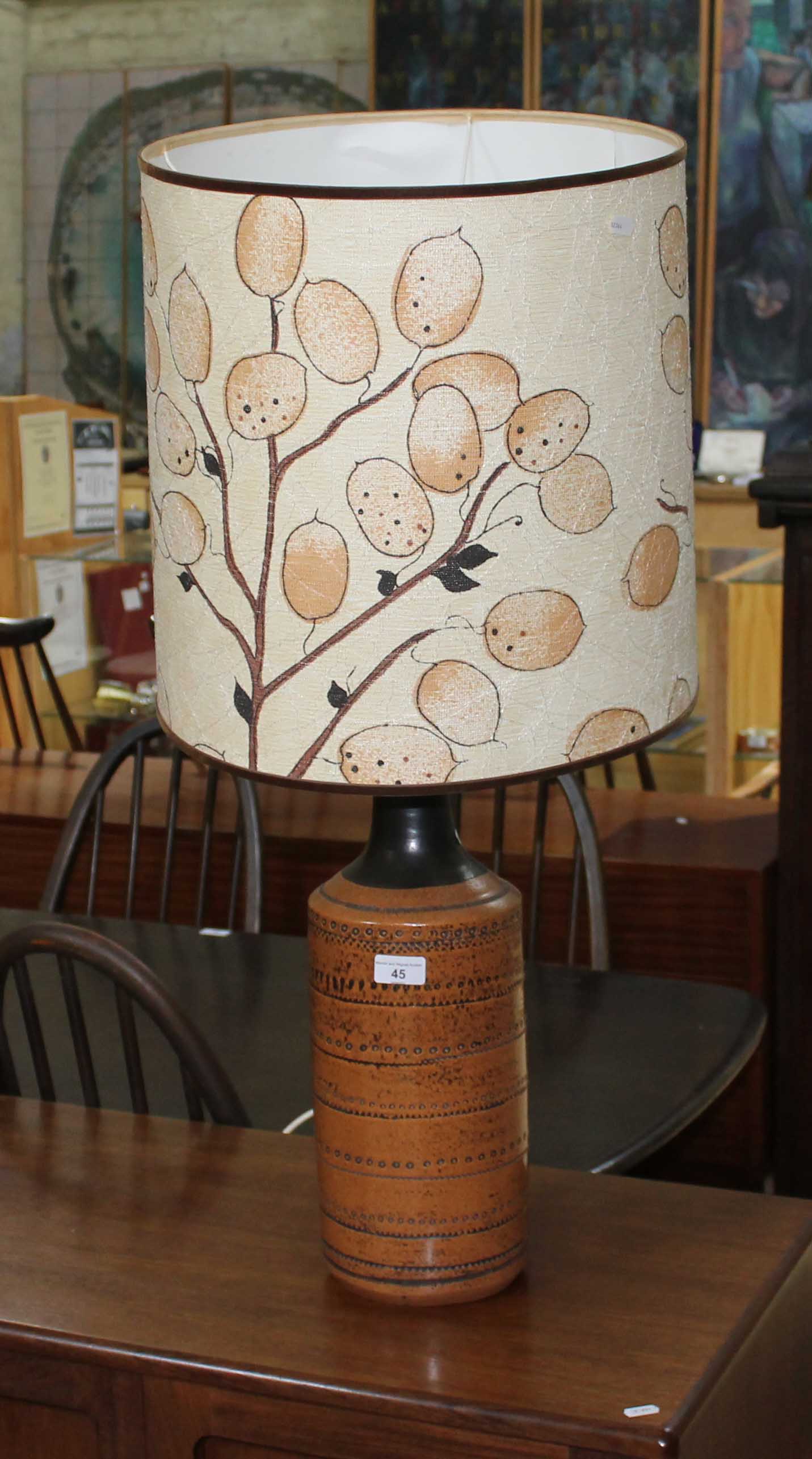 A mid 20th century table lamp with pottery base, height 88cm.