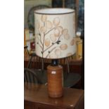 A mid 20th century table lamp with pottery base, height 88cm.