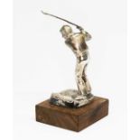 A limited edition silver figure of a golfer in full swing, inscribed 'The Golfer No. 411-1000',