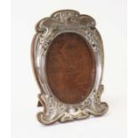 An Edward VII Art Nouveau style silver photograph frame with verse after Coleridge; 'Friendship is a