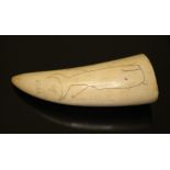 An early 20th century scrimshaw, engraved with a whale and the letter 'A', also dated '1901', length