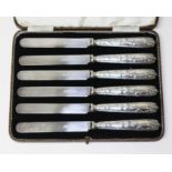 A George V cased set of Art Nouveau style silver handled butter knives, Elkington & Co Ltd,