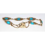 A hallmarked 9ct gold bracelet set with turquoise cabochons, length 18cm, gross wt. 8.7g.