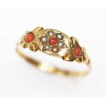 A Victorian seed pearl and coral ring, hallmarked 15ct gold, Chester 1882, gross wt. 1.4g, size R.