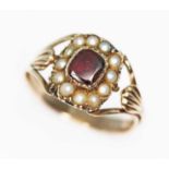 A mid 19th century split pearl and garnet ring, the cluster measuring approx. 10.88mm x 9.33mm,