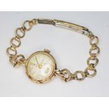 A ladies Rolex Tudor 9ct gold wristwatch with rolled gold strap. Condition - as found.