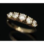 A five stone diamond ring, the round brilliant cut diamonds weighing approx. 0.16, 0.20, 0.24, 0.