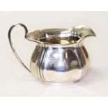 A hallmarked silver cream jug, length 14.5cm, wt. 7ozt.