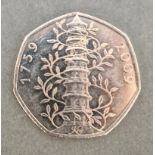 A circulated Kew Gardens 50p with a small group of collectable £2 & 50p coins.