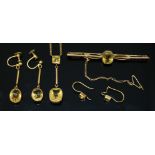 A suite of citrine set jewellery, early 20th century, comprising pendant necklace, bar brooch and