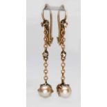 A pair of antique pearl and diamond drop earrings, each split pearl measuring approx. 5.95mm in