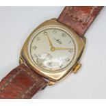 An Avia 9ct gold wristwatch, signed champagne dial with Arabic numerals and seconds subsidiary, 15