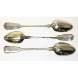 Three Victorian silver basting spoons comprising a pair by John James Whiting, London 1865, length