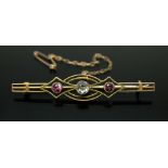 An early 20th century aquamarine and rhodolite set bar brooch, length 52mm, unmarked, gross wt. 3.