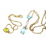 A paste set negligee necklace marked '375' and a peridot set bracelet indistinctly marked, the round