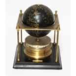 A Royal Geographical Society World Clock, height 28cm.