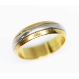 A hallmarked two colour 18ct gold wedding band, wt. 4.8g, size M. Condition - good, general wear