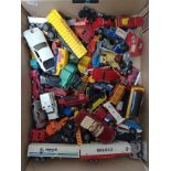 A box of die-cast model vehicles including Matchbox, Corgi, Majorette etc.