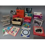 A box of mainly vintage view-masters to include colour and various reels, etc