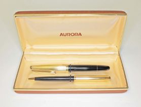 A cased Aurora fountain pen and ball point set.