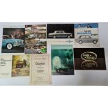 A box of assorted classic car brochures, including Jaguar, BMC, Landrover, Rangerover etc. circa