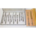 A cased set of knives and forks, the handles marked '800', the box marked 'Argento 800/000',