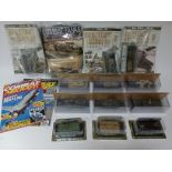 13 boxed military vehicles including tanks