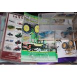 A box of mainly farm related magazines and 2 die-cast farm toys.