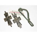 A Byzantine bronze reliquary cross, circa 12th century, together with a medieval bronze clip.