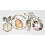 A mixed lot comprising a hallmarked silver bangle and a hallmarked silver ingot pendant, a